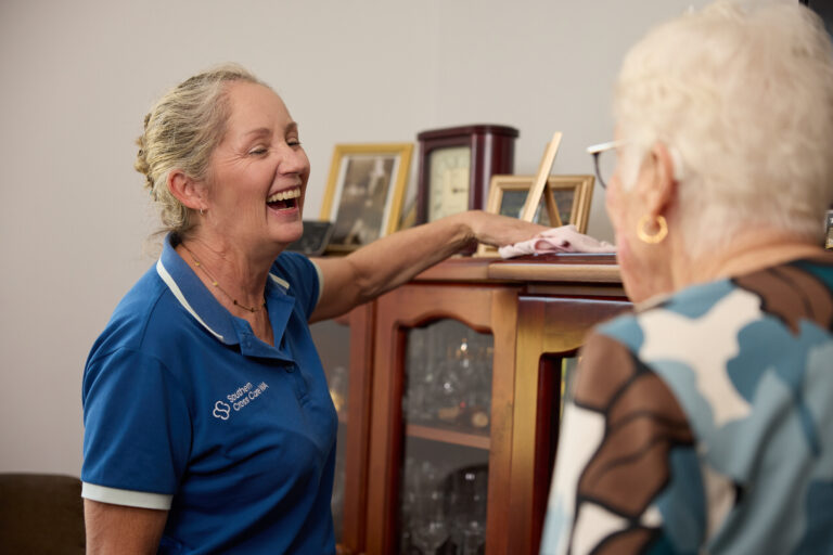 SCCWA support worker cleaning for a Support at Home client